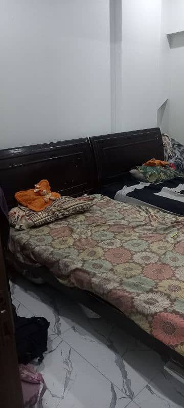 2 same single bed wooden along with molty foam mattress 1