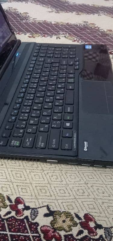 fujitsu corei3 big screen labtop very new conditions and rat 5