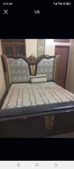 Bed with mattress and dressing with dividers