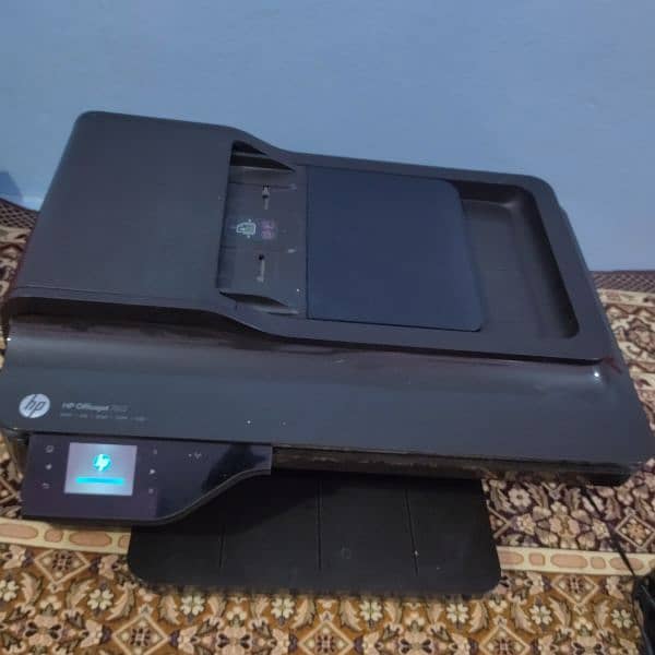 HP Officejet 7612 Inkjet printer with colourful prints. 1