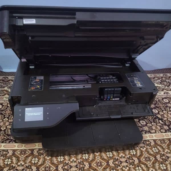 HP Officejet 7612 Inkjet printer with colourful prints. 3