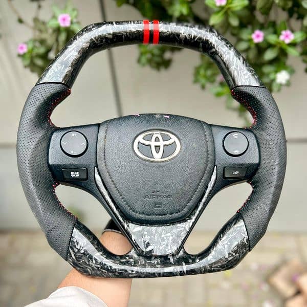 Toyota Corolla Grande Carbon fiber steering 1