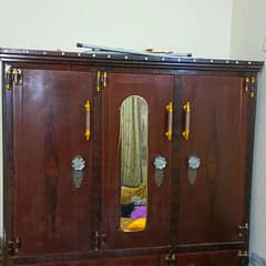 large 3 door iron cupboard near 6.5 feet height 6 feet width