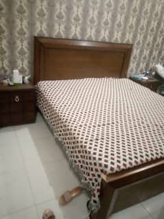 double bed with side table