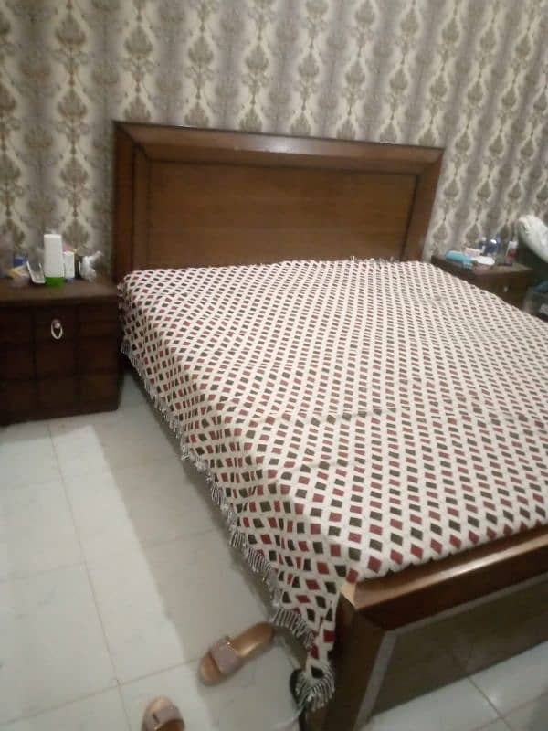 double bed with side table 0