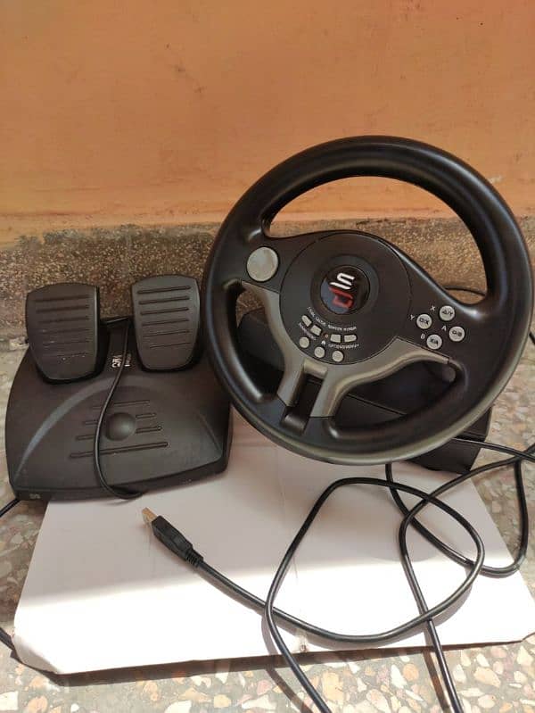 Gaming wheel with padel 1