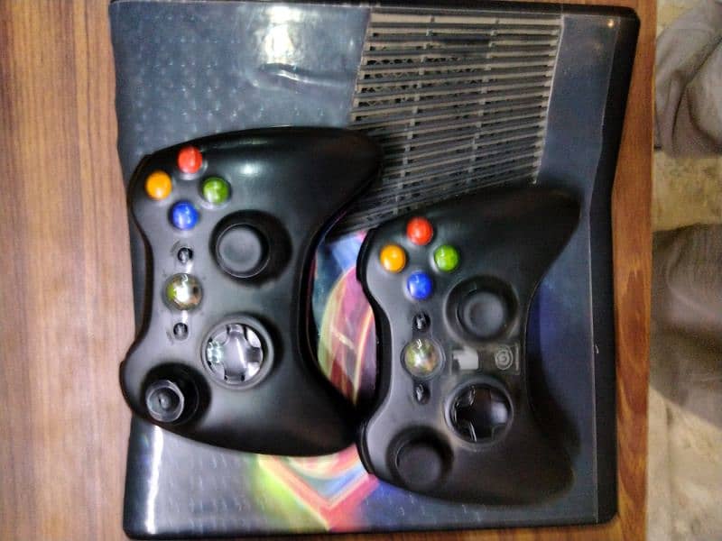 XBOX 360 SLIM WITH TWO CONTROLLER 9