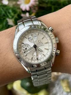 OMEGA Speedmaster automatic chronograph triple date