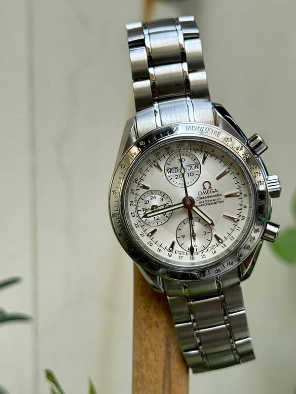 OMEGA Speedmaster automatic chronograph triple date 6