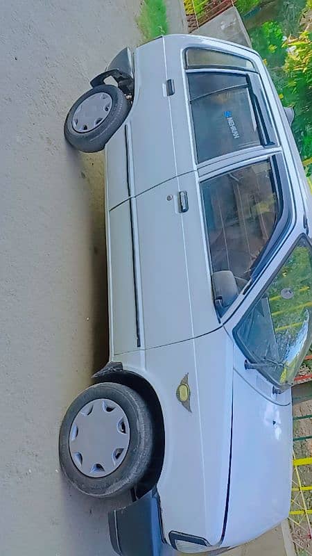 Suzuki Mehran VXR 05 last ki hai, andar say genuine hai,vvip fmly car 10