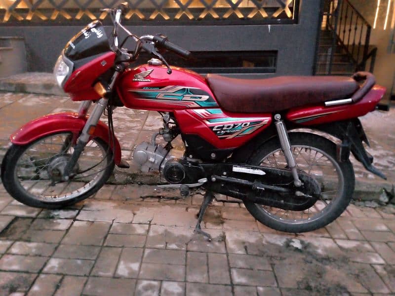 Honda cd70 Dream 2022 model Islamabad number lush condition 0