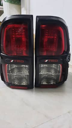 Revo Tail lights and grill Original