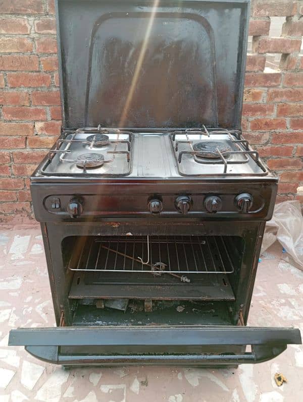 Cooking range with different burner 5