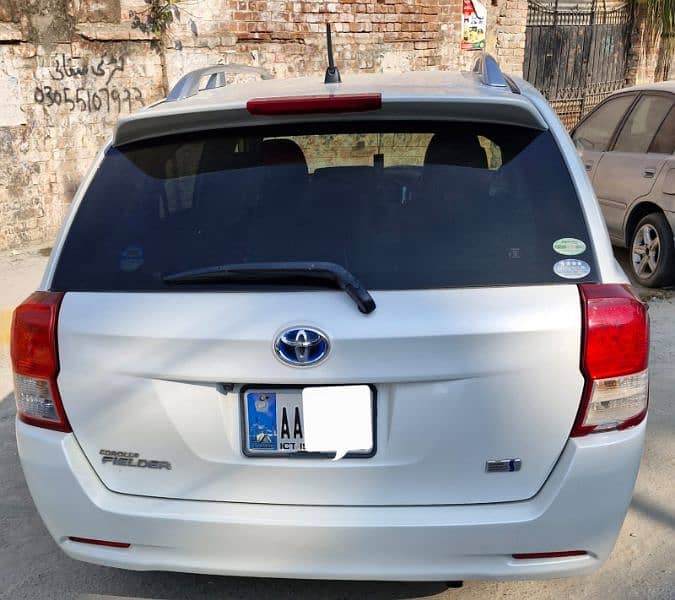 Toyota Fielder hybrid 2014 1