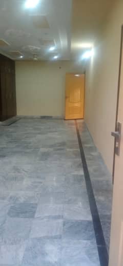 16 Marla lower portation marble tile floor Seprate entrance prime location main road near market masjid