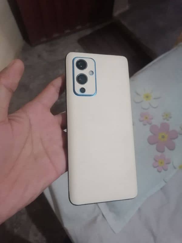 OnePlus 9 5g 8+8/128 lines han back chnge & non approved ha 0