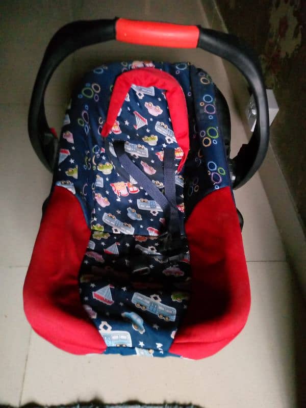 carry cot,high chair and swing 1