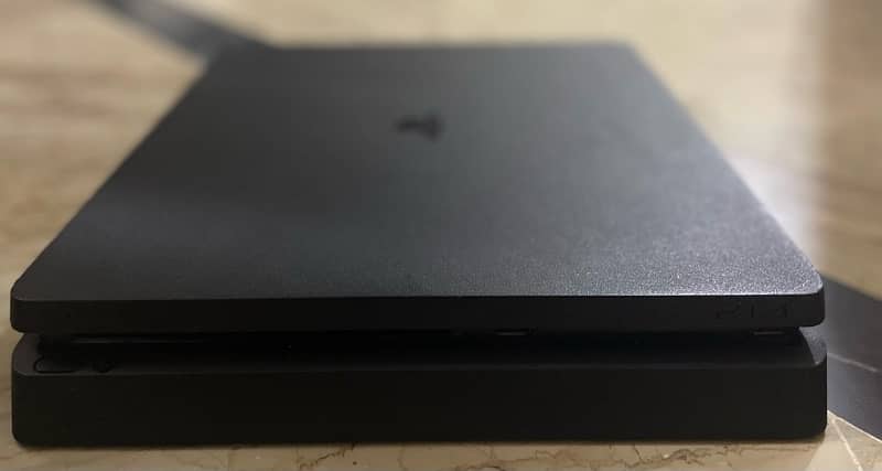 PS 4 Slim 500 GB 0