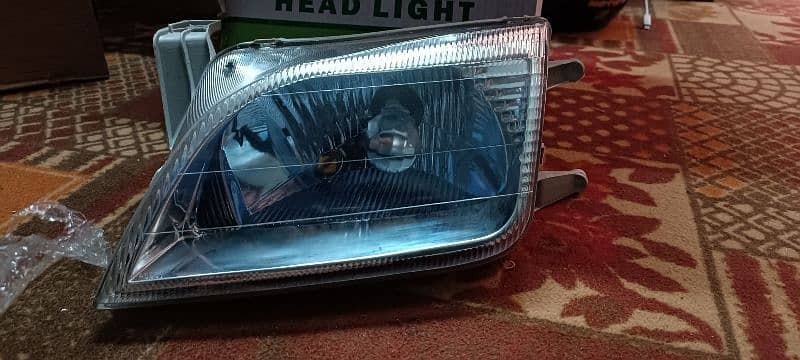 cultus headlights pair brand new blue chrome 0