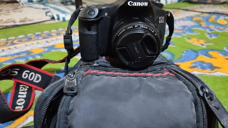 Canon 60-D with Kit lens+ Canon 1.8 prime lens 4