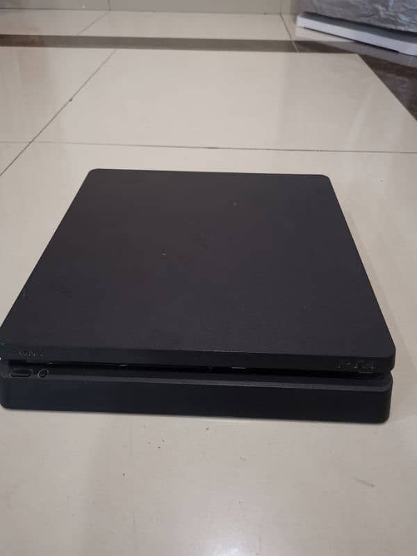 ps 4 slim 500gb with 2 controler and 3 games 1