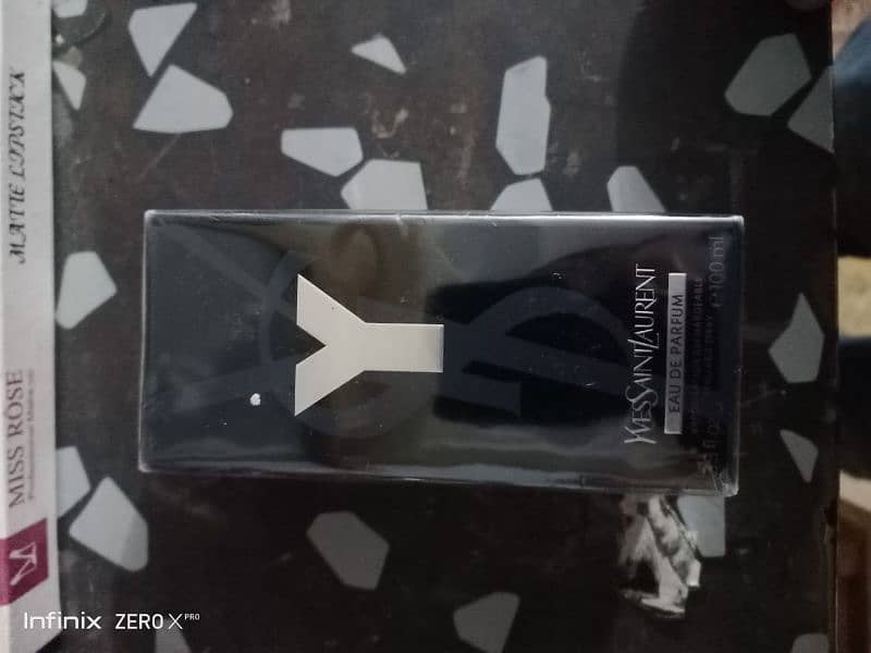 iam selling brand  new perfume made in France yves saint laurent 0