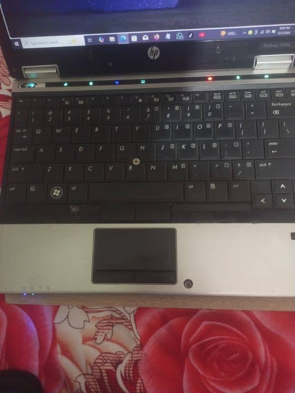 hp elite 2540 corei7 , 8 GB ram, ssd installed no any fault urgnt sale 1