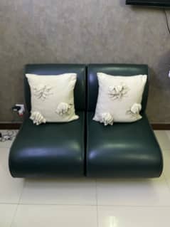 Single seater sofas (x2) with cushins