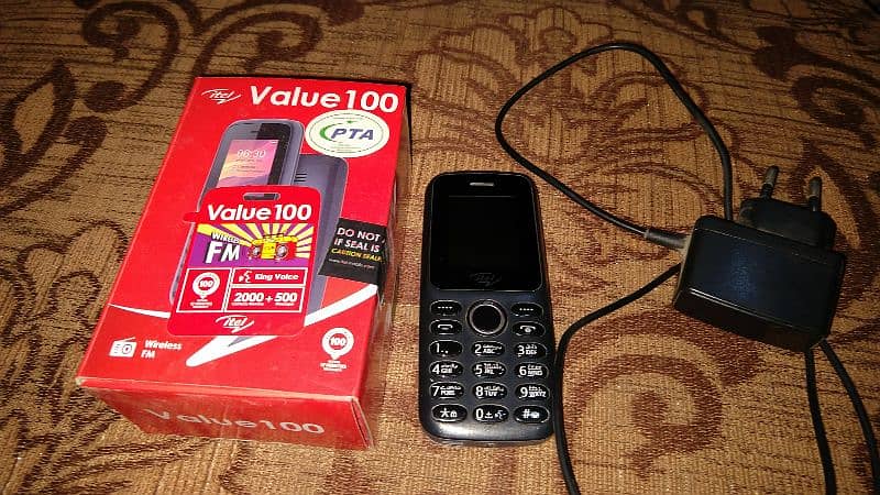 itel it2163 mobile with box and charger 0