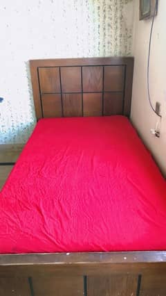 wooden single bed without mattress