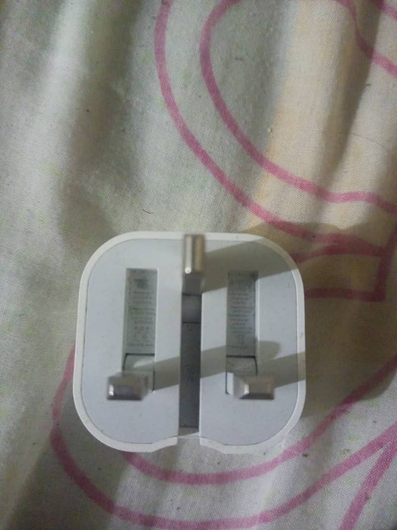 The iPhone has an original charger. 2