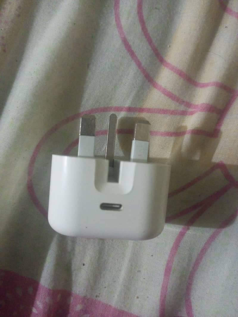 The iPhone has an original charger. 4