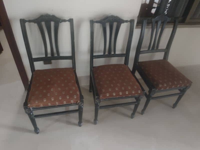 Plastic PVC chairs with table and wooden chairs 2