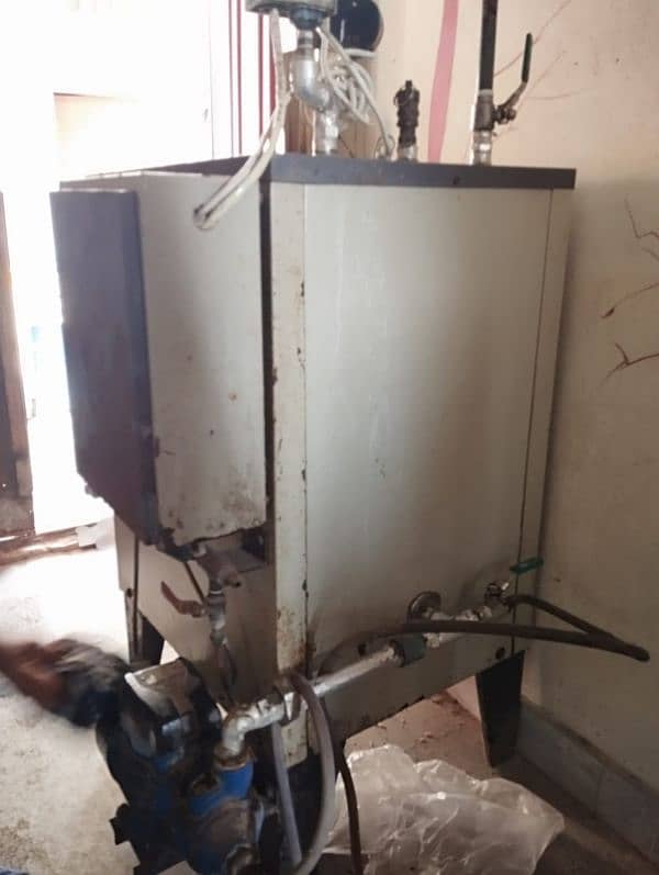 3 Iron Boiler - 1 Season Used, Excellent Condition" 1