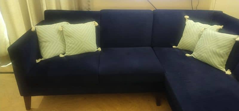 Almost new L shape sofa 1