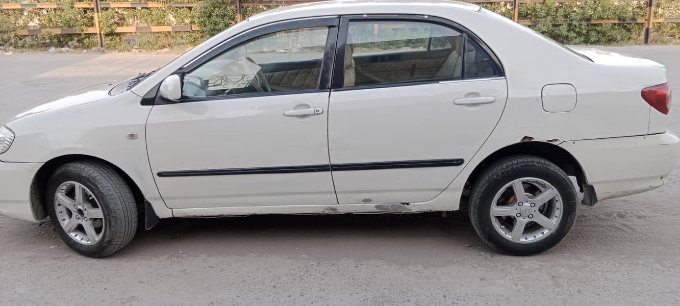 Toyota Corolla XLI 2006 white color urgent sale 11