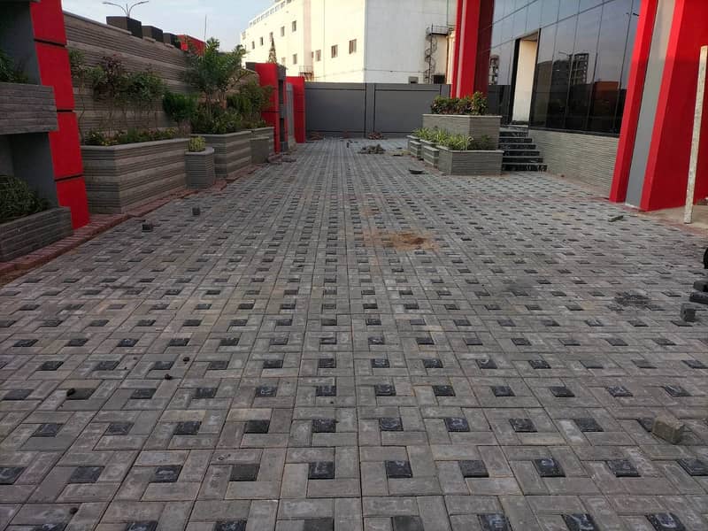 We are manufacturing pavers and kerb stones along with complete Fixing 11