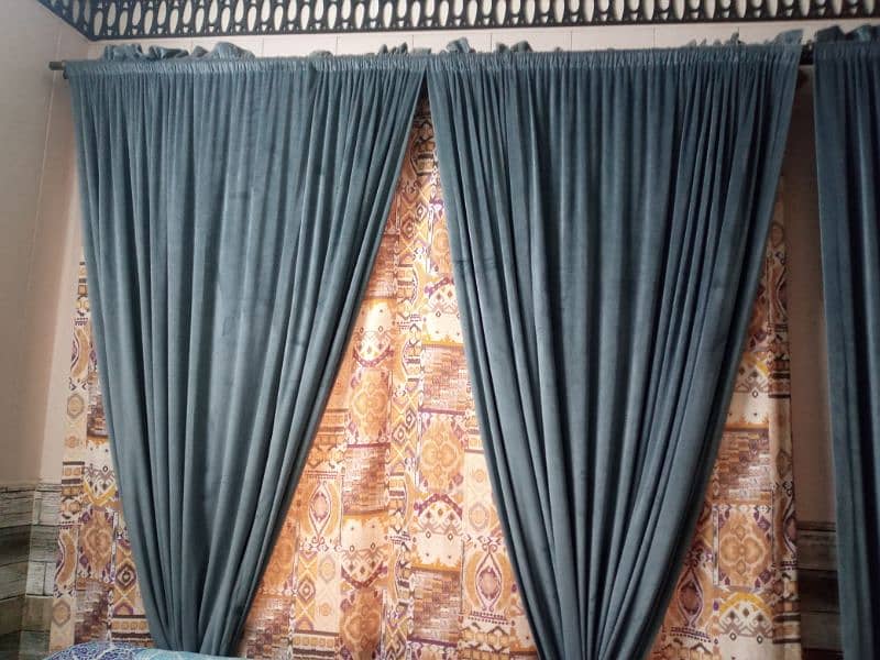 5 velvet curtains and 1 printed curtain 3