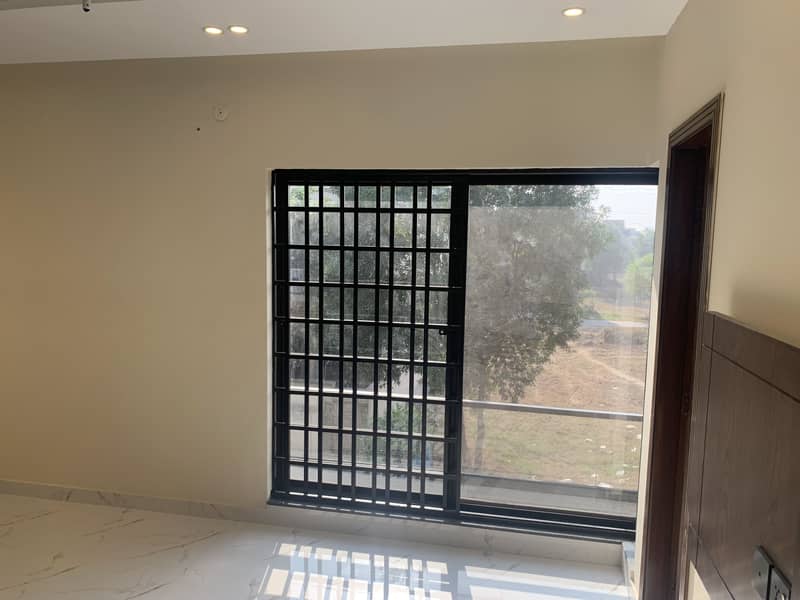 5 MARLA BEAUTIFUL BRAND NEW HOUSE IS AVAILABLE FOR SALE ON A TOP NOTCH LOCATION IN DHA PHASE 11 RAHBAR SECTOR 2 LAHORE 35