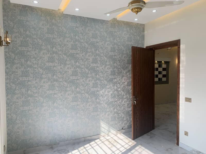 10 MARLA HOUSE ON "50" FEET WIDE ROAD BRAND NEW WOW LOCATION OF DHA PHASE 11 RAHBAR SECTOR 1 IS AVAILABLE FOR SALE 13