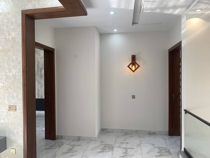 10 MARLA HOUSE ON "50" FEET WIDE ROAD BRAND NEW WOW LOCATION OF DHA PHASE 11 RAHBAR SECTOR 1 IS AVAILABLE FOR SALE 40