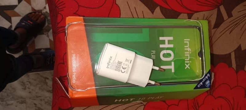 infinix hot 10 play condition 10 by 10 and with box and charger 3