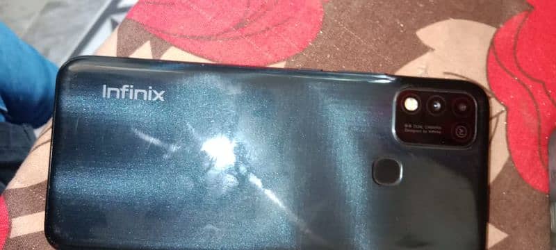 infinix hot 10 play condition 10 by 10 and with box and charger 5