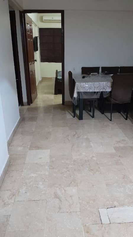 Magnificent flat for sale in Gulshan-e-Iqbal, Block 4 Modern American Kitchen With modern facilities and stylish design. 12