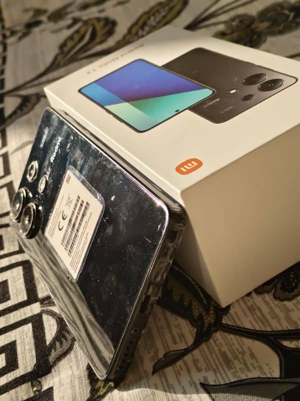 Redmi note 13 (Xiaomi) 1