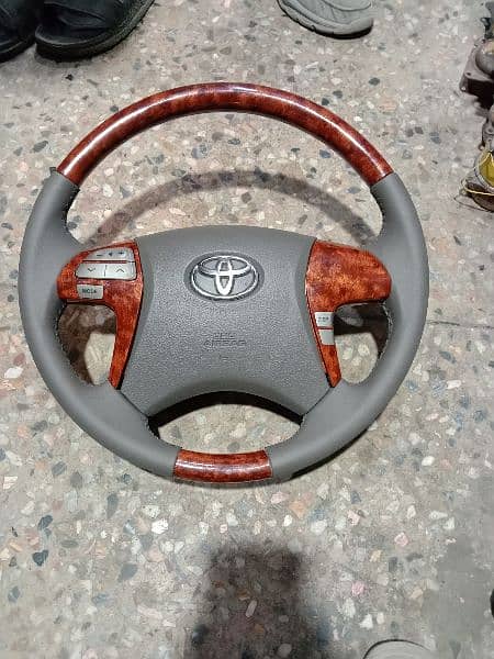 Toyota axio perimo x Corolla steering wheel multimedia 1