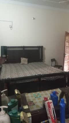 a beautiful wooden bed set with matress