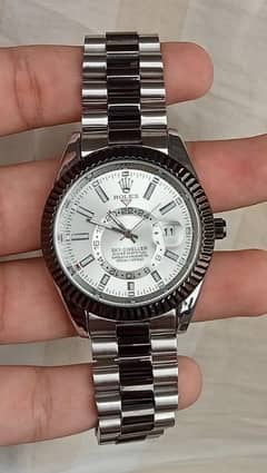 rolex sky dweller black and silver