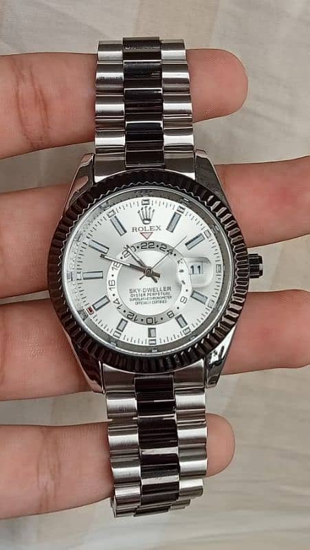 rolex sky dweller black and silver 0