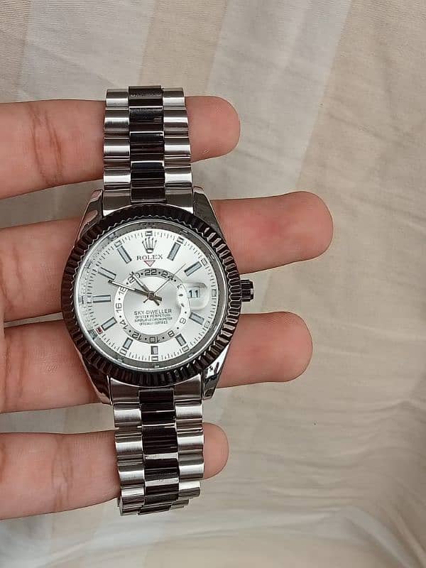 rolex sky dweller black and silver 4